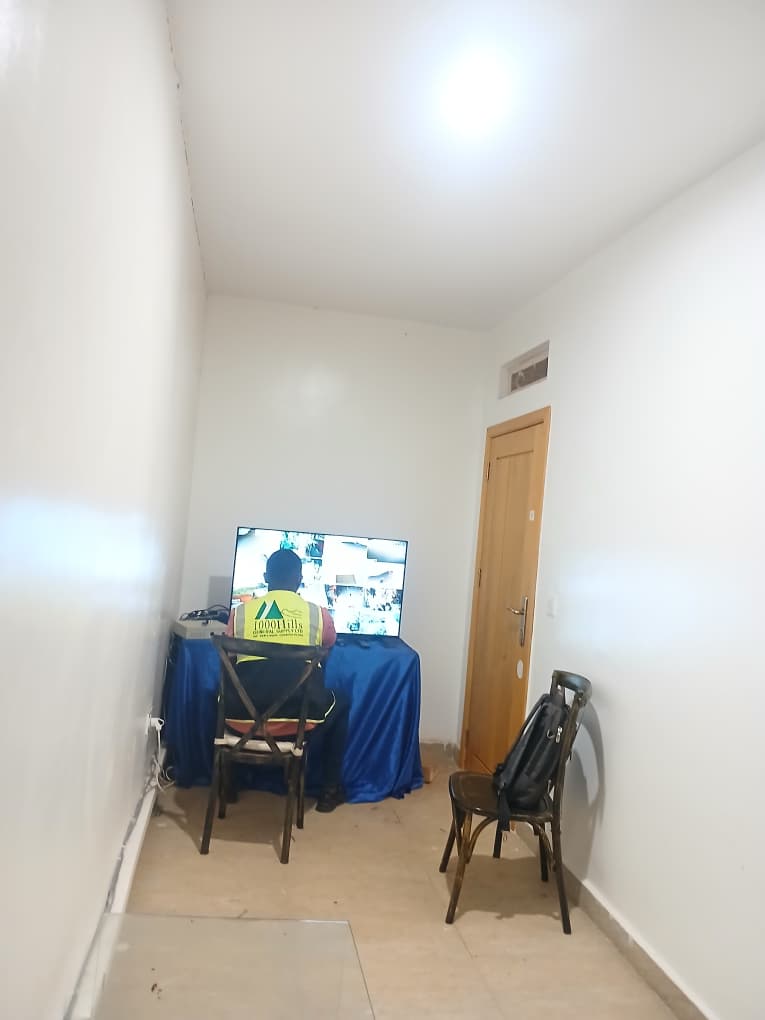 Technician validating camera system setup during project deployment